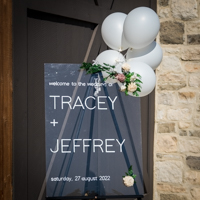 Tracey and Jeff sign
